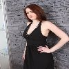 Young sex contact in Edinburgh with long red hair and big tits, very affectionate and playful, with soft flowing hair, sparkling eyes, and irresistibly succulent lips